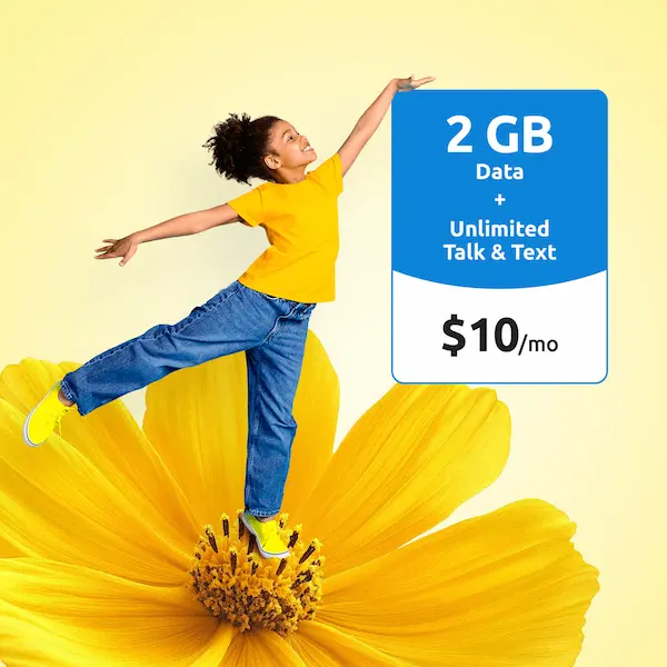 Girl in yellow shirt leaping on a giant yellow flower beside a "2 GB Data + Unlimited Talk & Text, $10/mo" price card